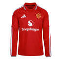A red long-sleeve Manchester United soccer jersey by Adidas, featuring white stripes on the shoulders and sleeves, the Manchester United crest on the chest, and the Snapdragon sponsor logo in white.