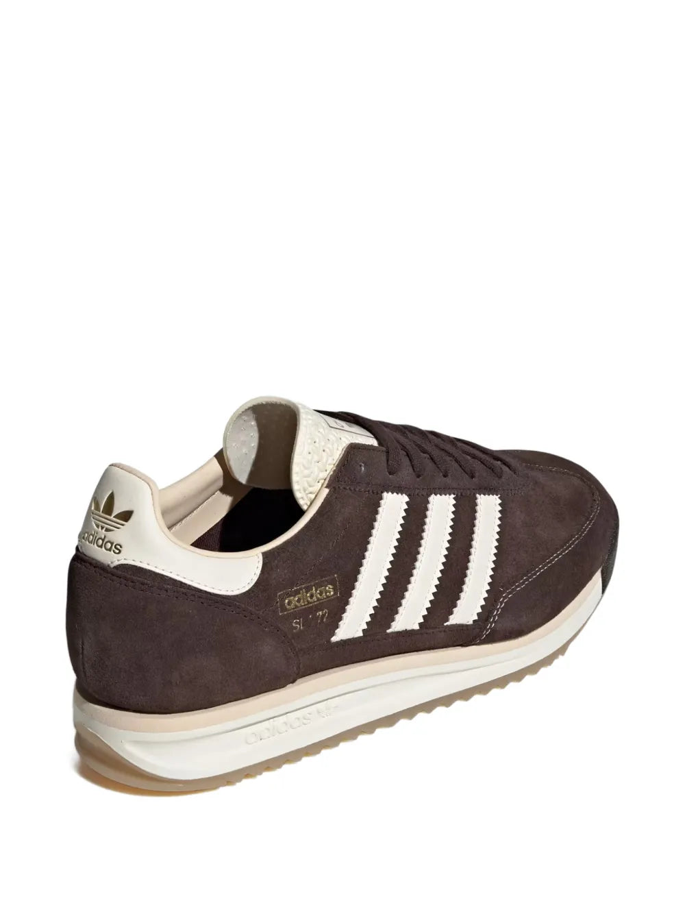 A dark brown suede Adidas S-7 sneaker shown from a three-quarters rear angle, featuring white three-stripes, a cream collar, and a cream midsole on a white background.