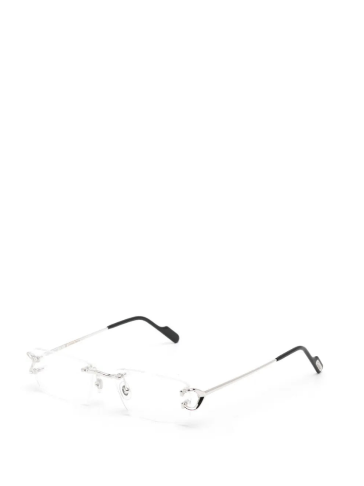 Rimless eyeglasses with a thin silver metal frame and black temple tips, shown on a plain white background.