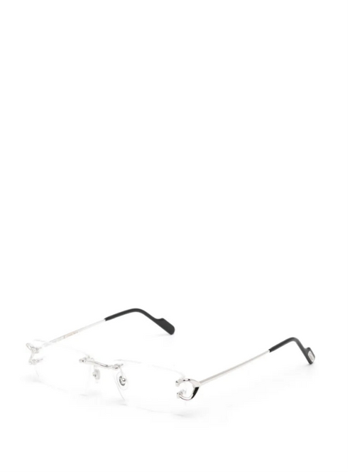 Rimless eyeglasses with a thin silver metal frame and black temple tips, shown on a plain white background.