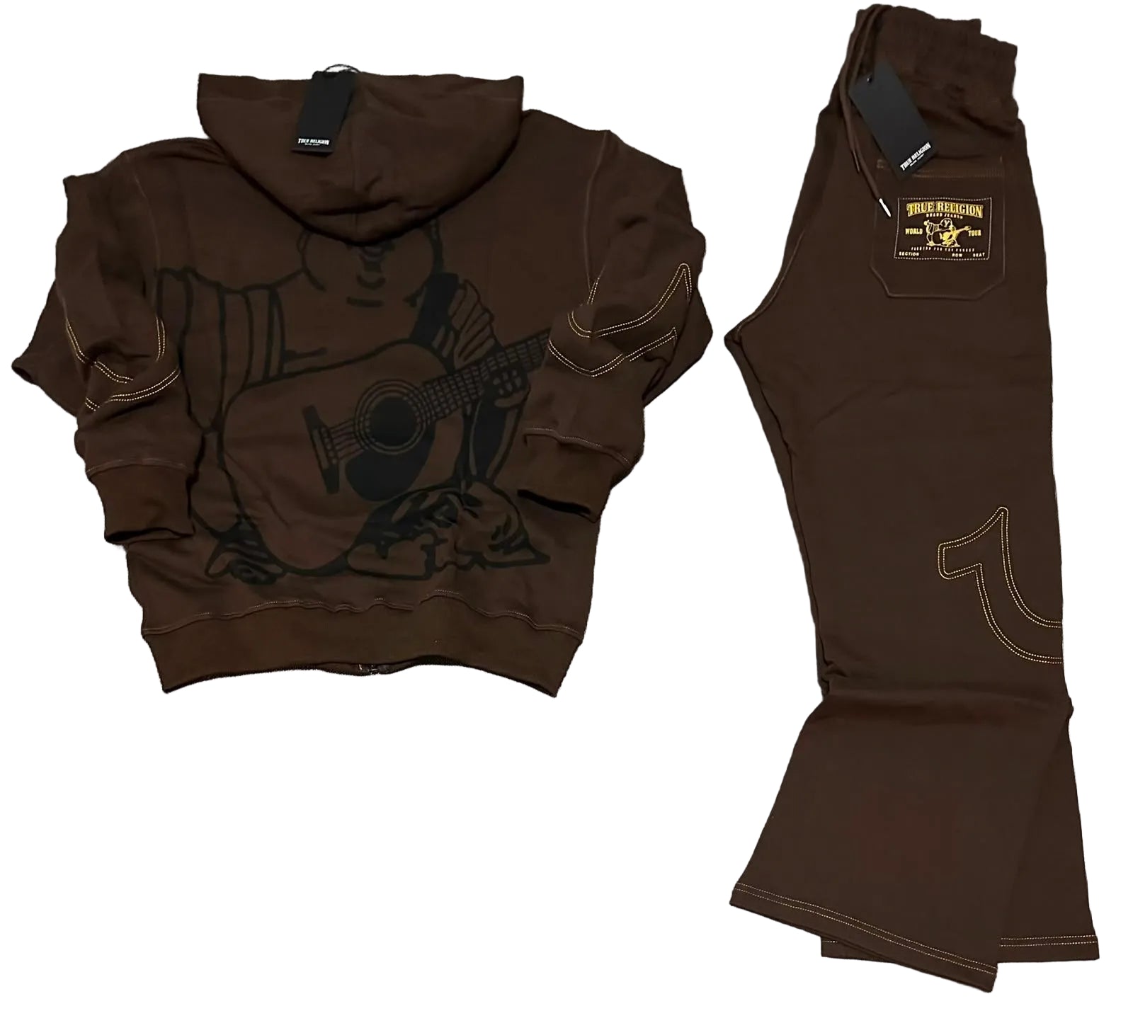 A dark brown two-piece tracksuit laid flat on a gray carpet background, consisting of a cropped zip-up hoodie with a guitar graphic and matching flared pants with contrast stitching and a brand patch.