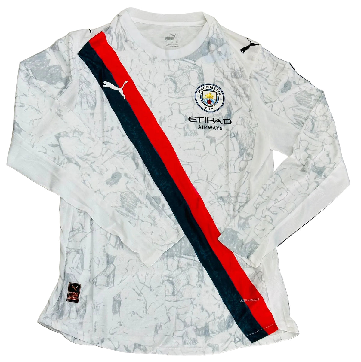 White sports jersey with red and blue stripes on a beige background