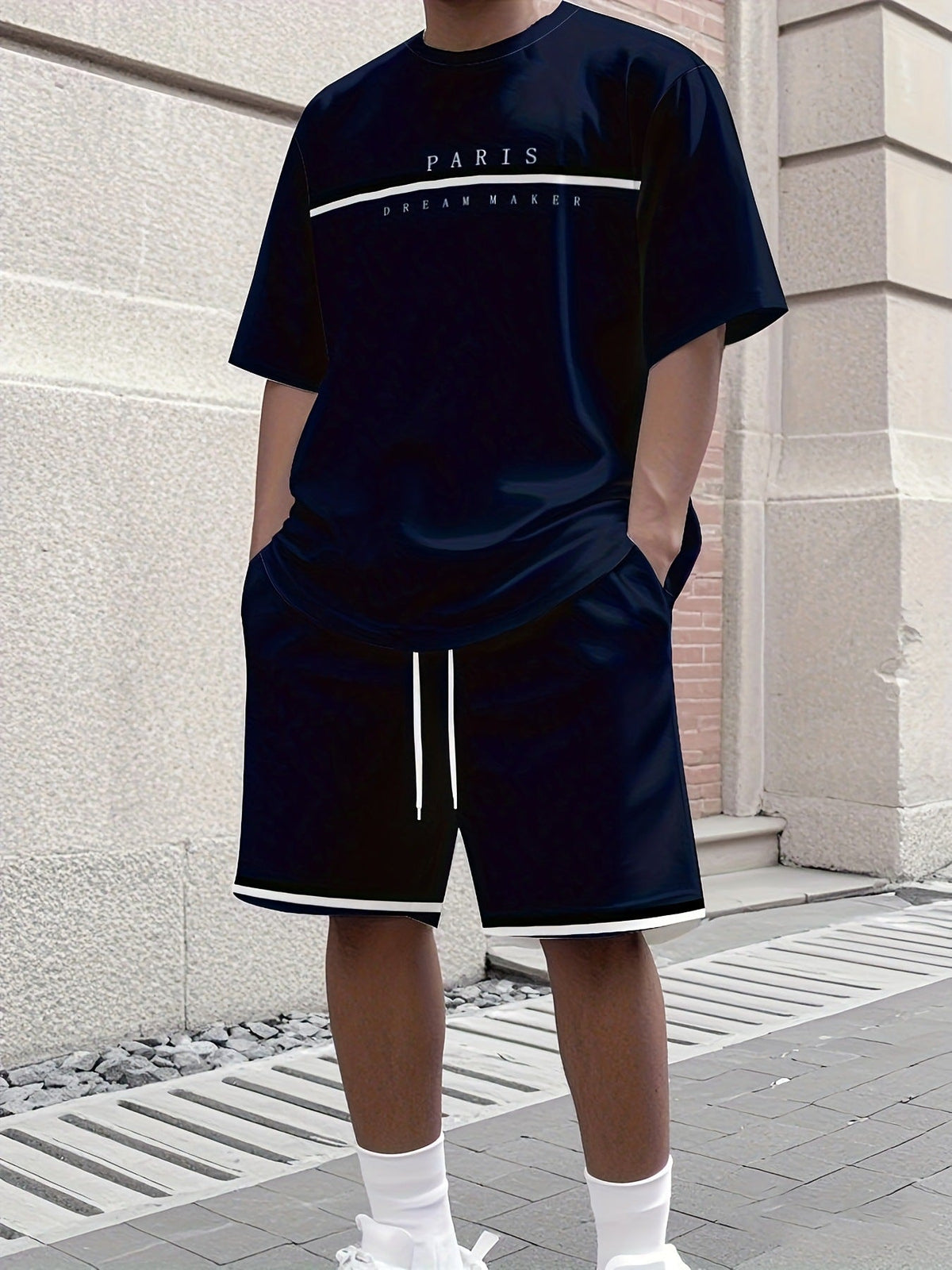South Steeze men's black summer jogging set with a short sleeve Paris Dream Maker t-shirt and matching shorts.